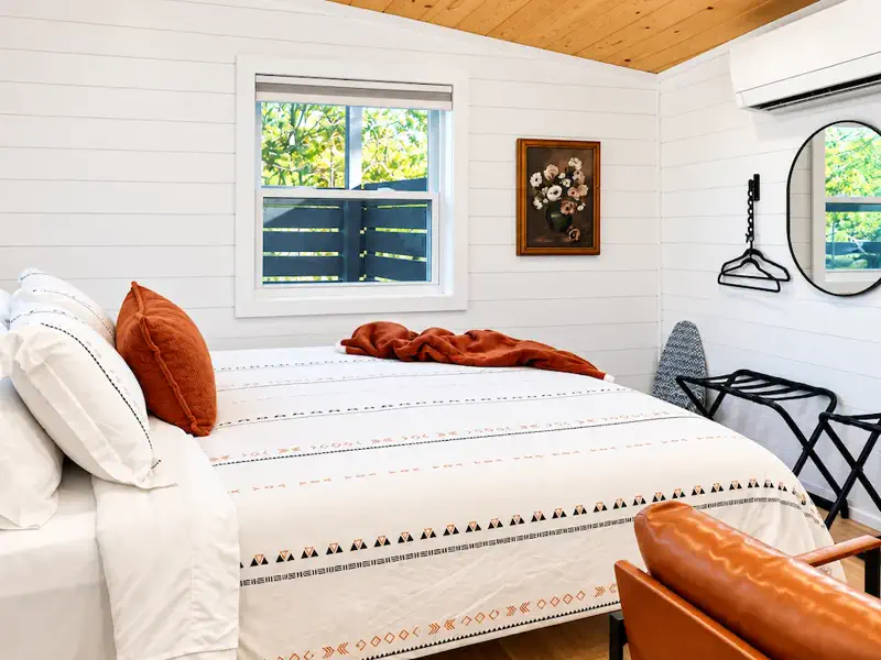 Queen bed inside Tiny on the Ridge near Downtown Blue Ridge, Georgia