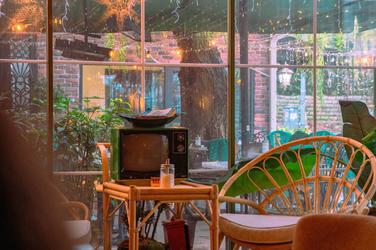 Warm, welcoming cafe interior as an illustration of rainy-day indoor activities for couples
